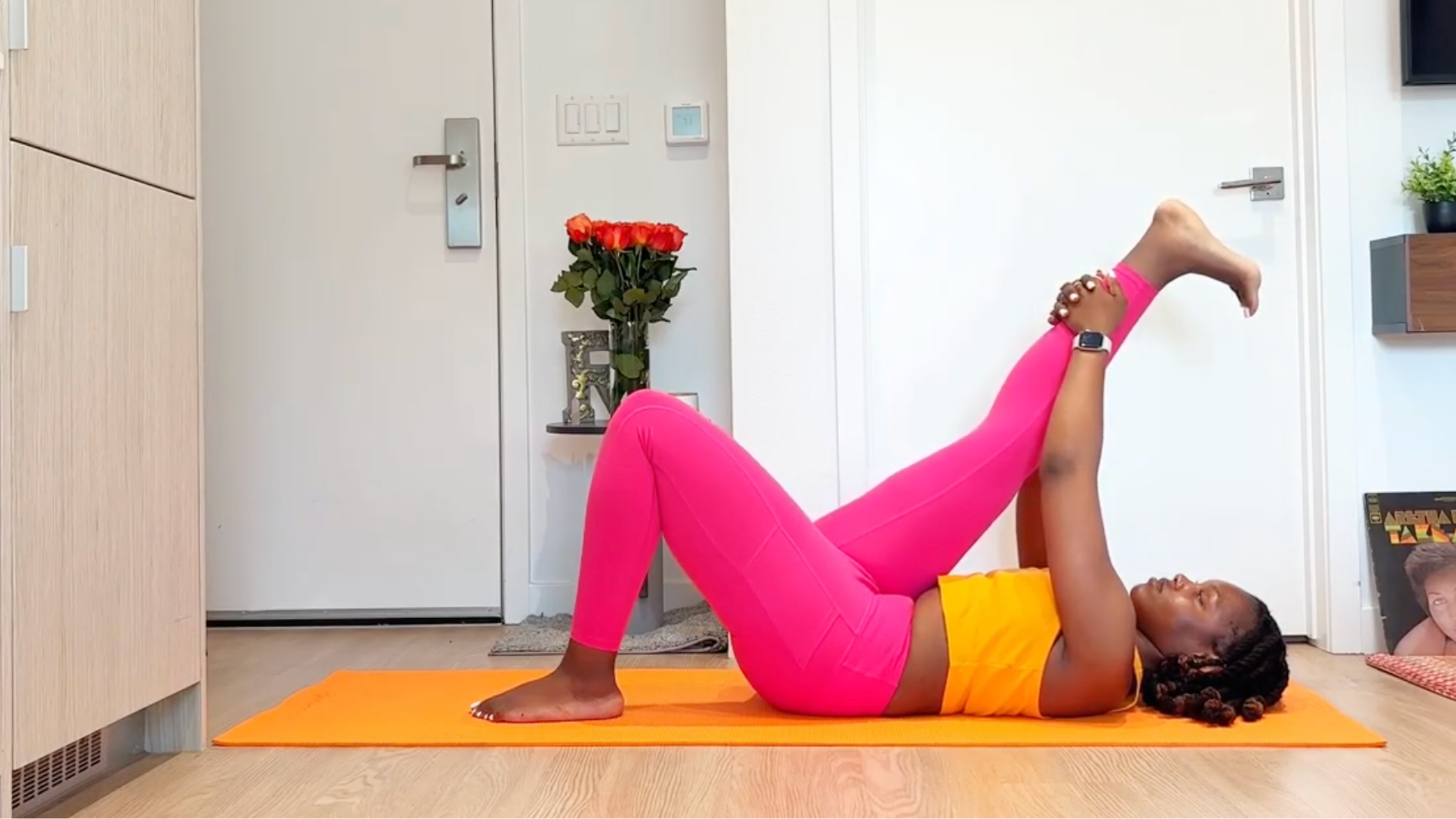 Yoga teacher practicing Hamstring Stretch